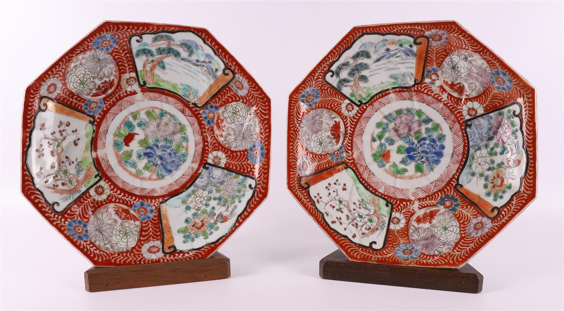 A pair of porcelain octagonal dishes on a stand ring, Japan, Meiji, 19th C.