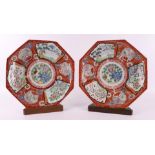 A pair of porcelain octagonal dishes on a stand ring, Japan, Meiji, 19th C.