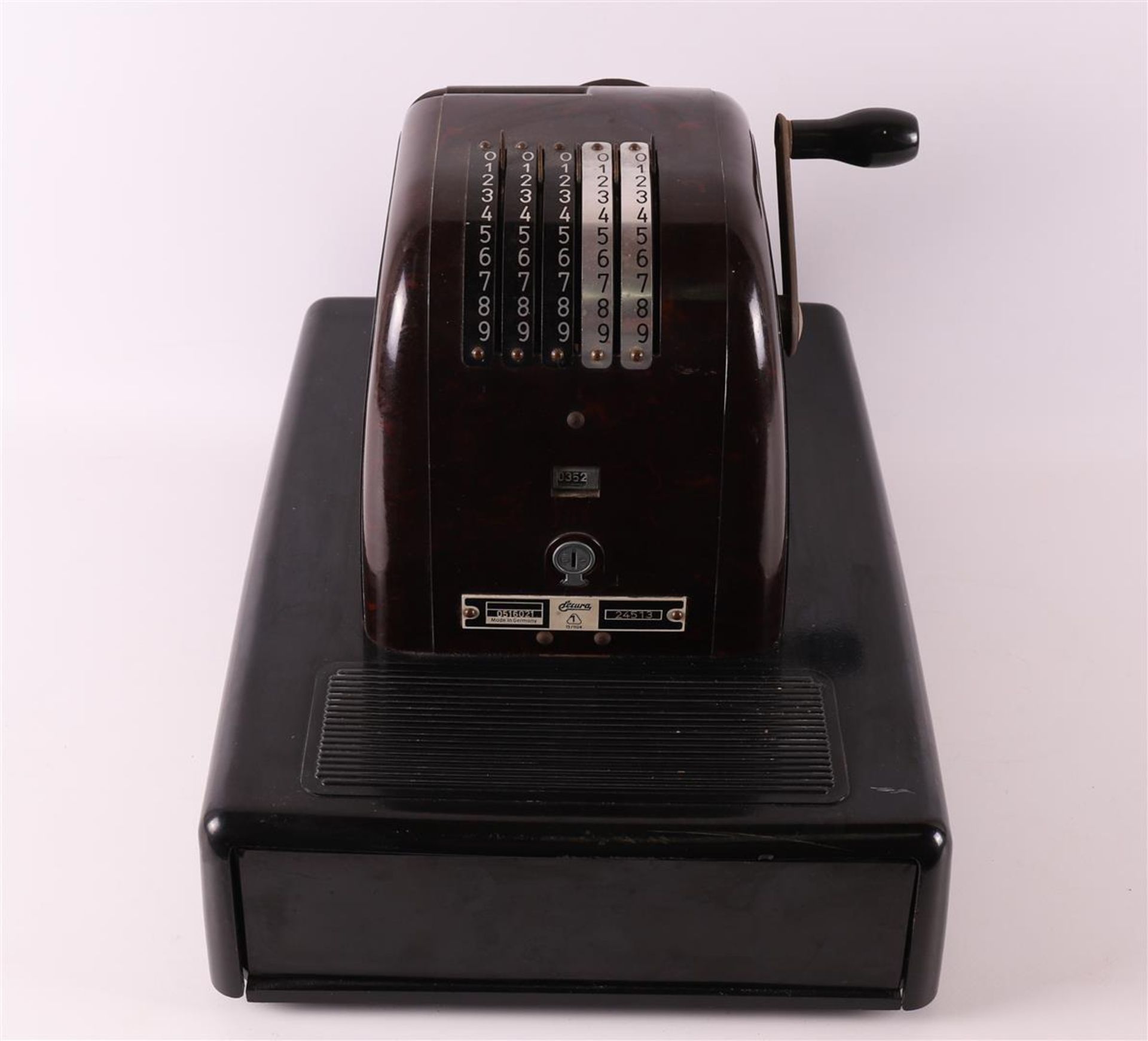 A brown Bekelite cash register, Secura, Germany, ca. 1930.