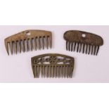 Three various bronze curry combs, 18th century.