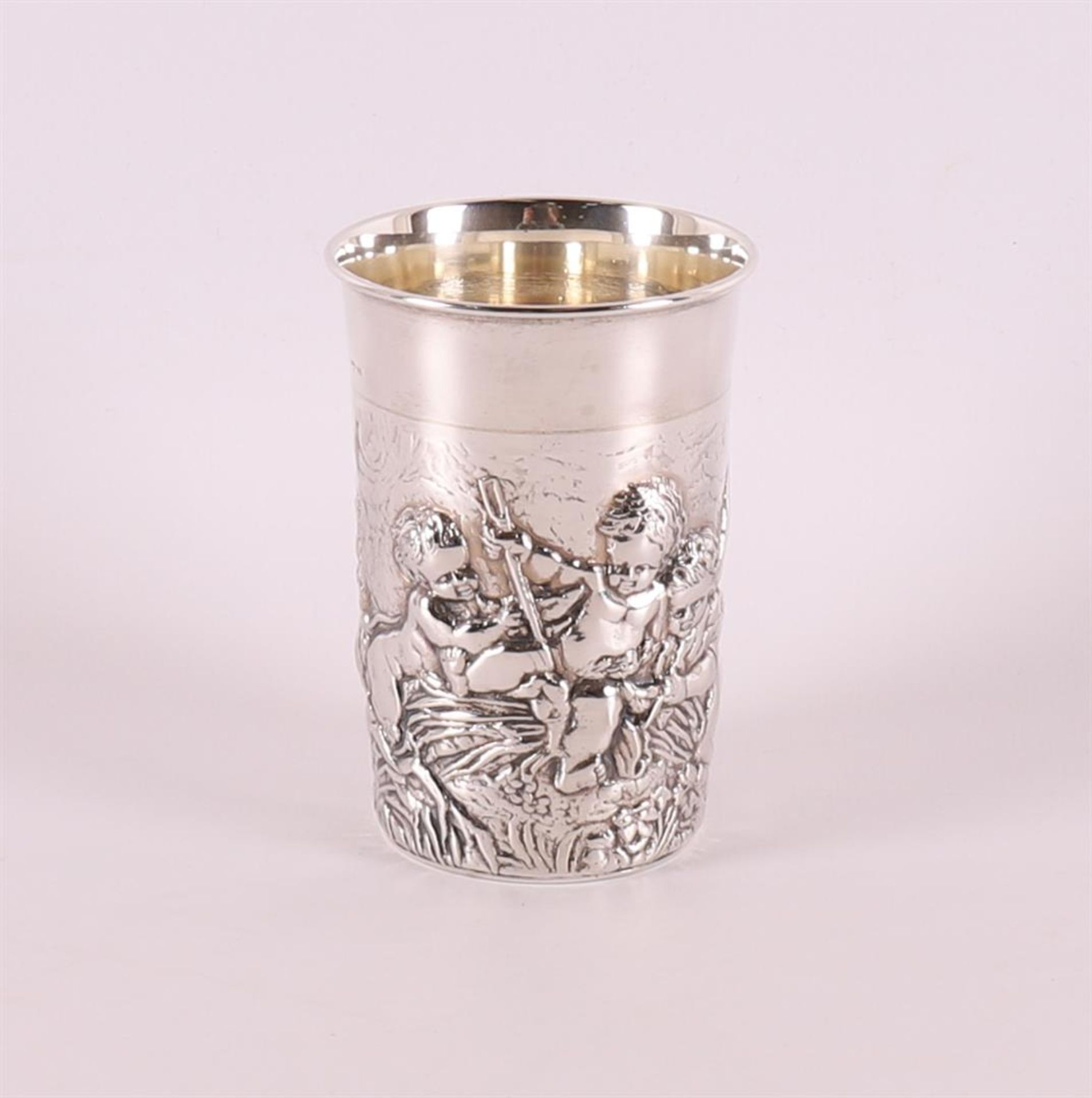 A 2nd grade 835/1000 silver birth cup with an image of putti. - Image 2 of 4