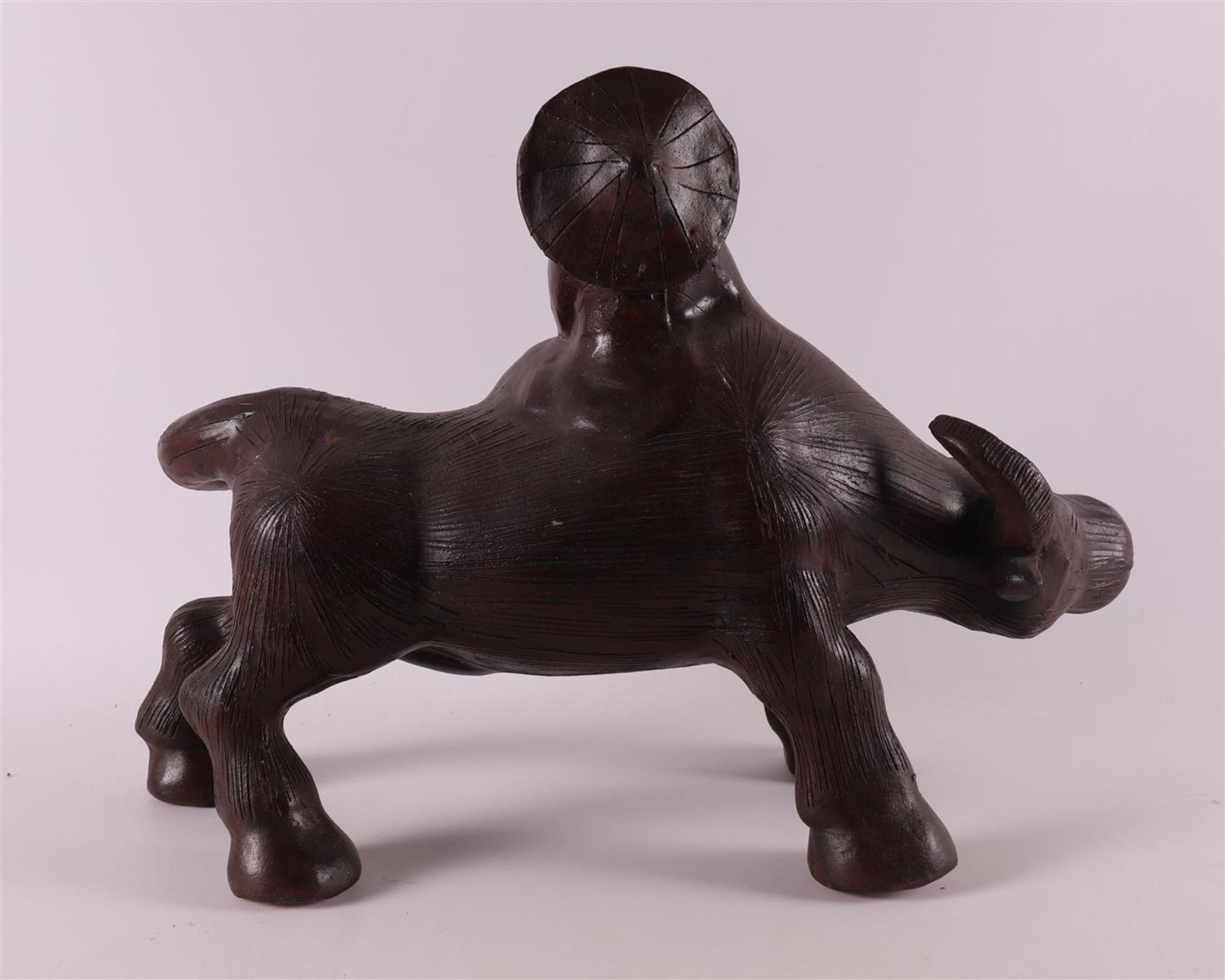A stoneware water buffalo with a fool on its back, China, 21st century. - Bild 4 aus 4