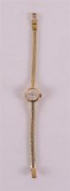 A women's wristwatch in a 14 kt gold case and ditto gold strap, marked: Restatio