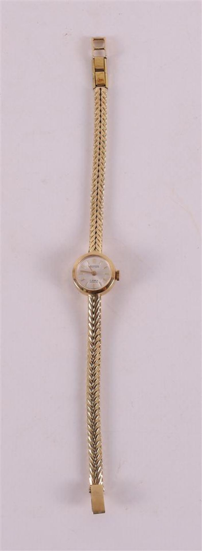 A women's wristwatch in a 14 kt gold case and ditto gold strap, marked: Restatio