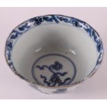 A blue and white porcelain bowl on a stand ring, China, 18th century.