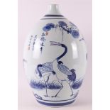 A blue and white porcelain oval vase, China, 21st century.