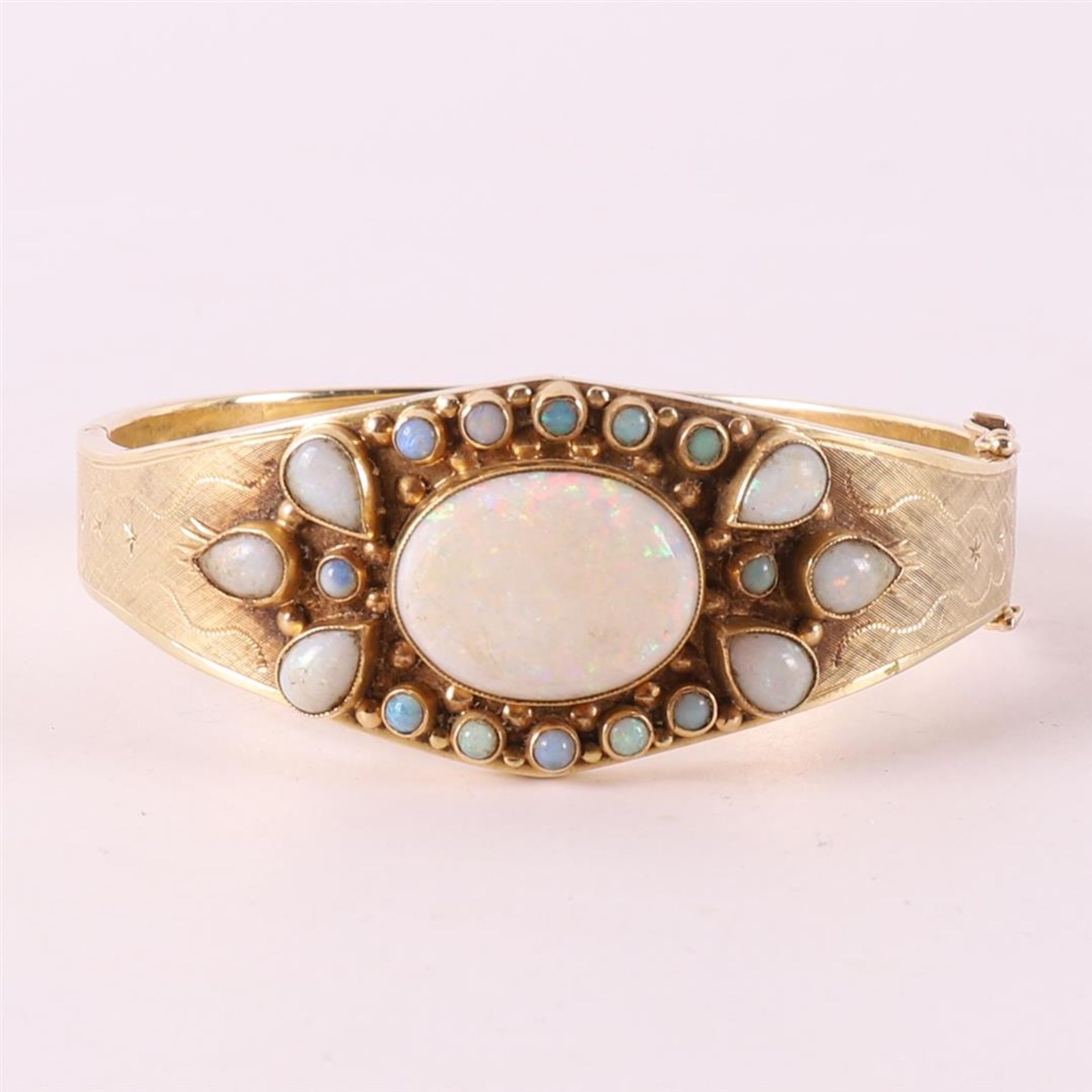 A 14 carat 585/1000 yellow gold rigid bracelet with opal and colored stones. - Image 2 of 3