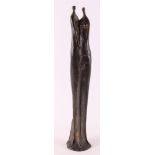 A brown patinated bronze sculpture of a man and woman, modern/contemporary