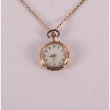 A women's pendant watch in 14 kt yellow gold engraved case, on a gold necklace,