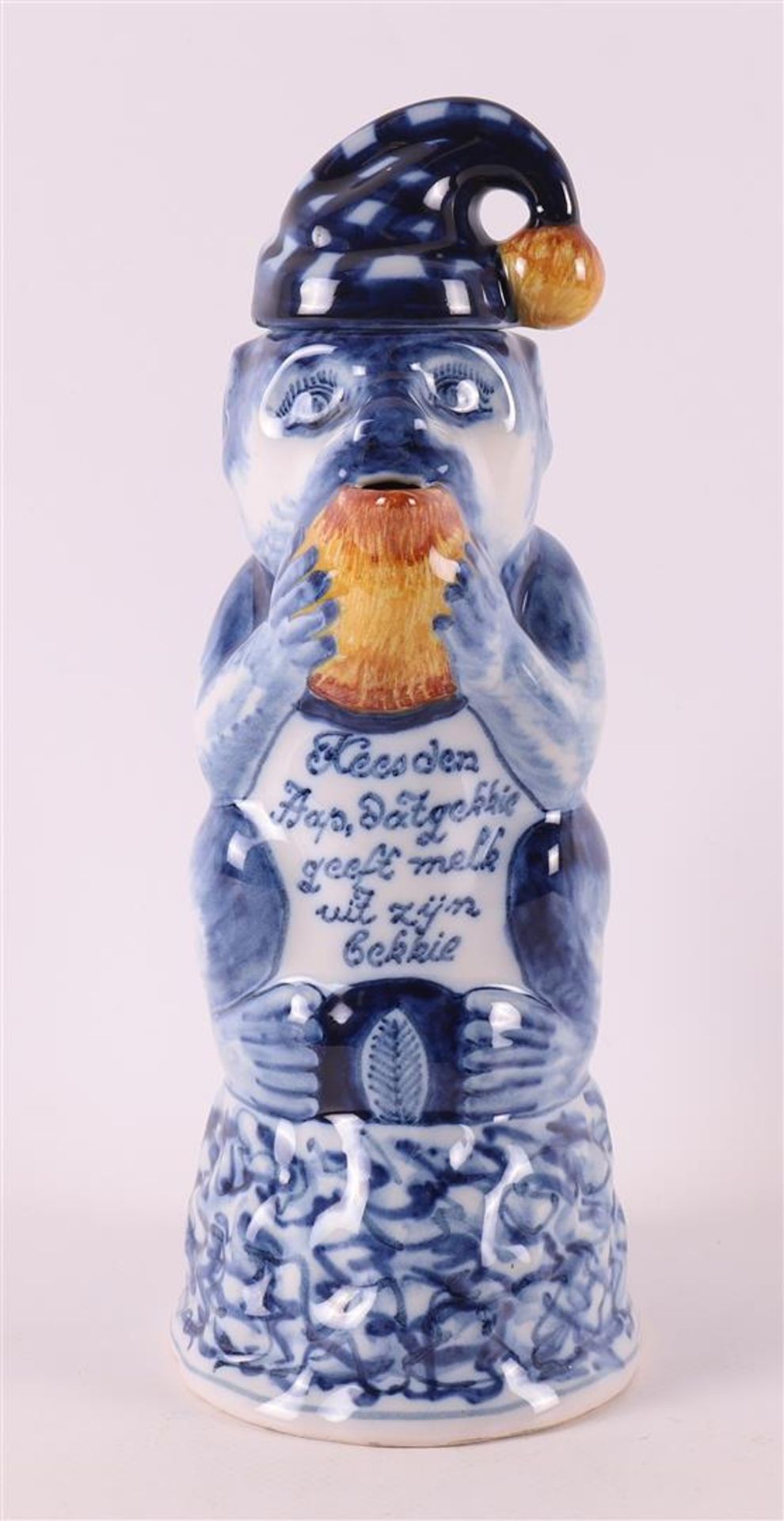 A blue and white earthenware milk jug in the shape of a monkey, after the 18th c