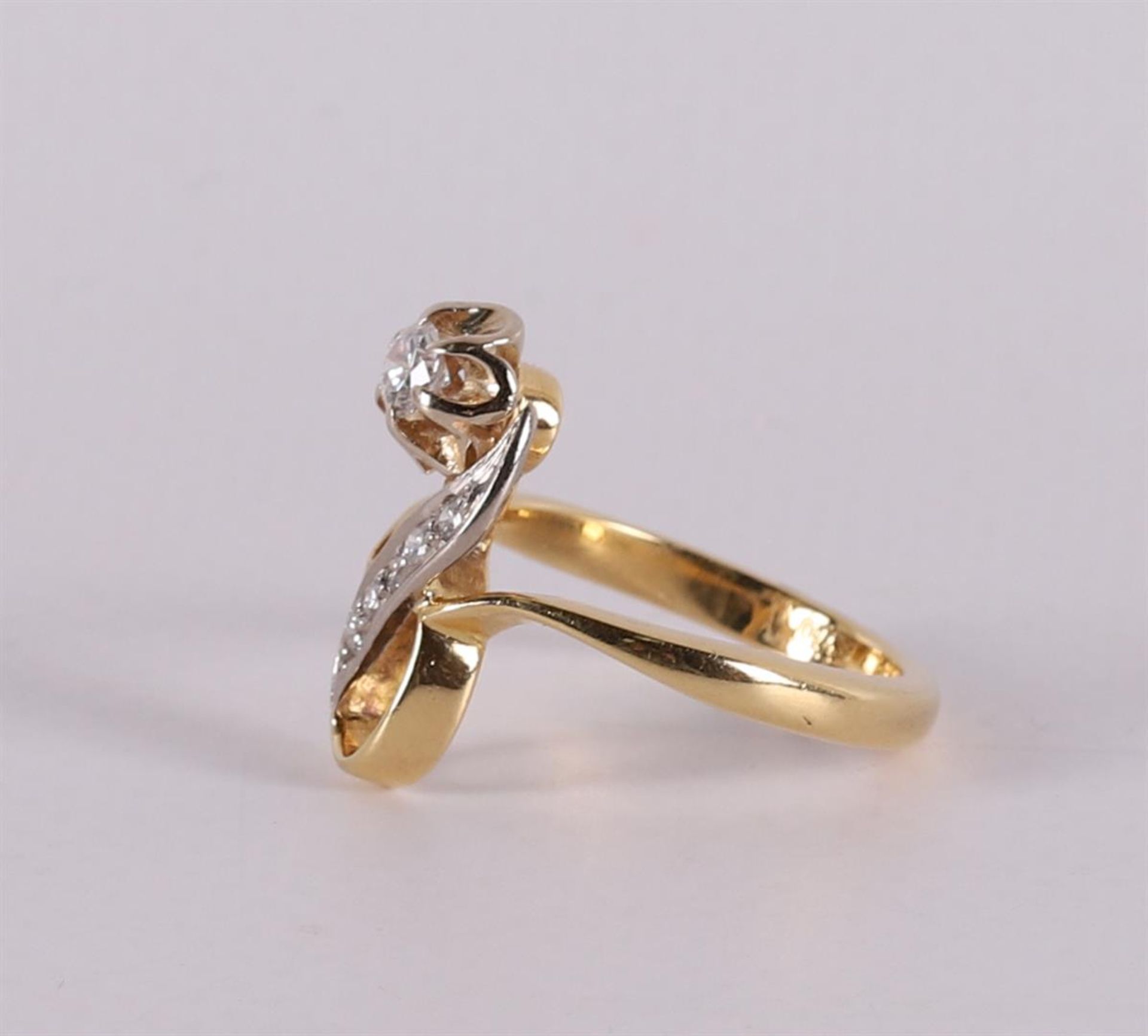 An 18 carat gold ring in the shape of a flower with a brilliant. - Image 2 of 3