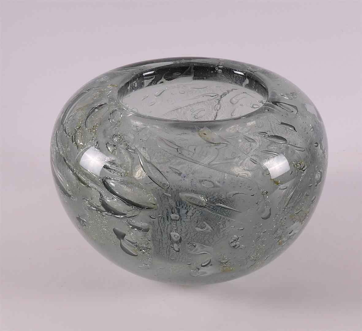 A thick-walled clear glass unica vase with enclosed air bubbles, A.D. Copier.