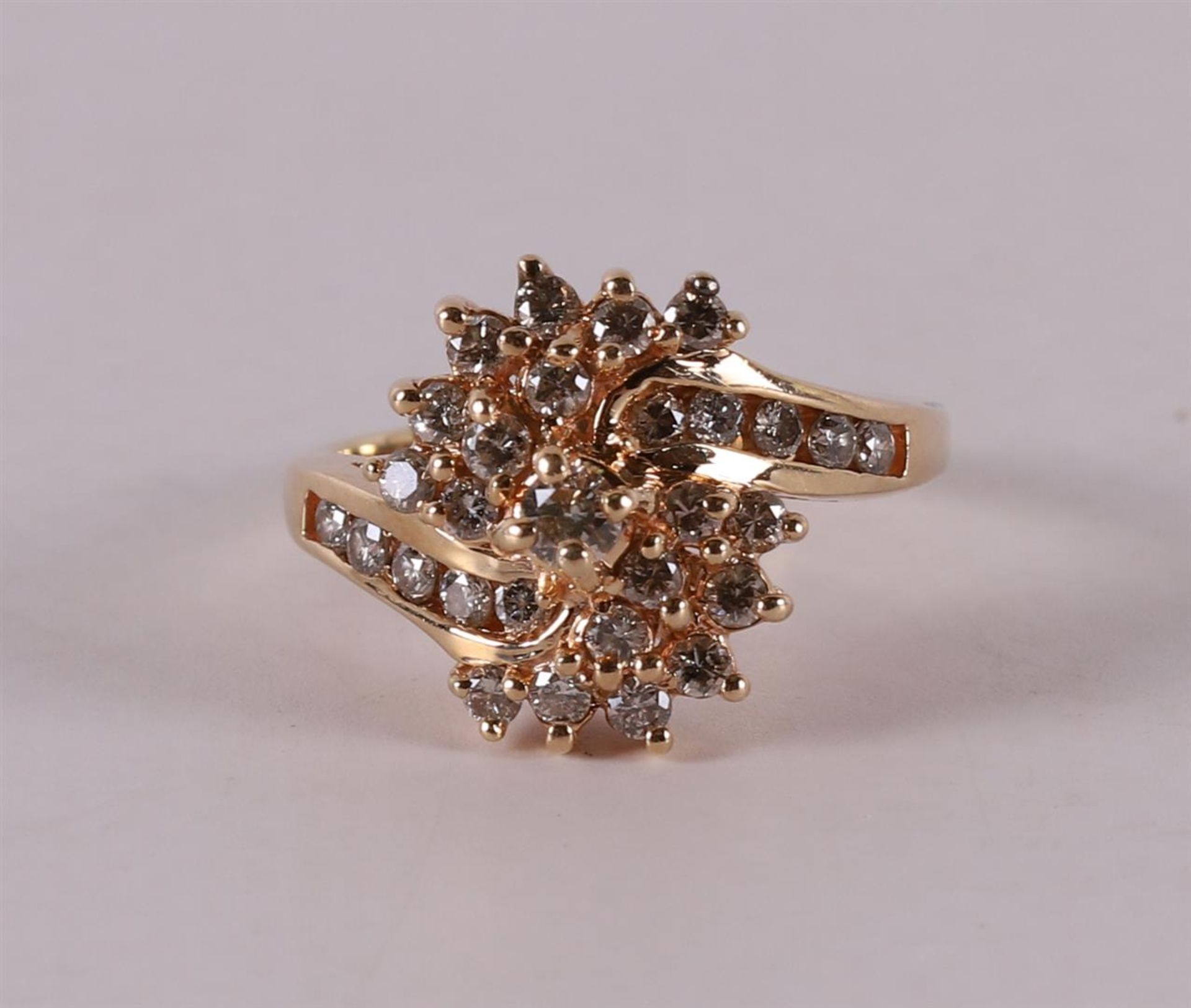 A 14 kt gold women's ring, set with 30 brilliant cut diamonds. - Image 2 of 3