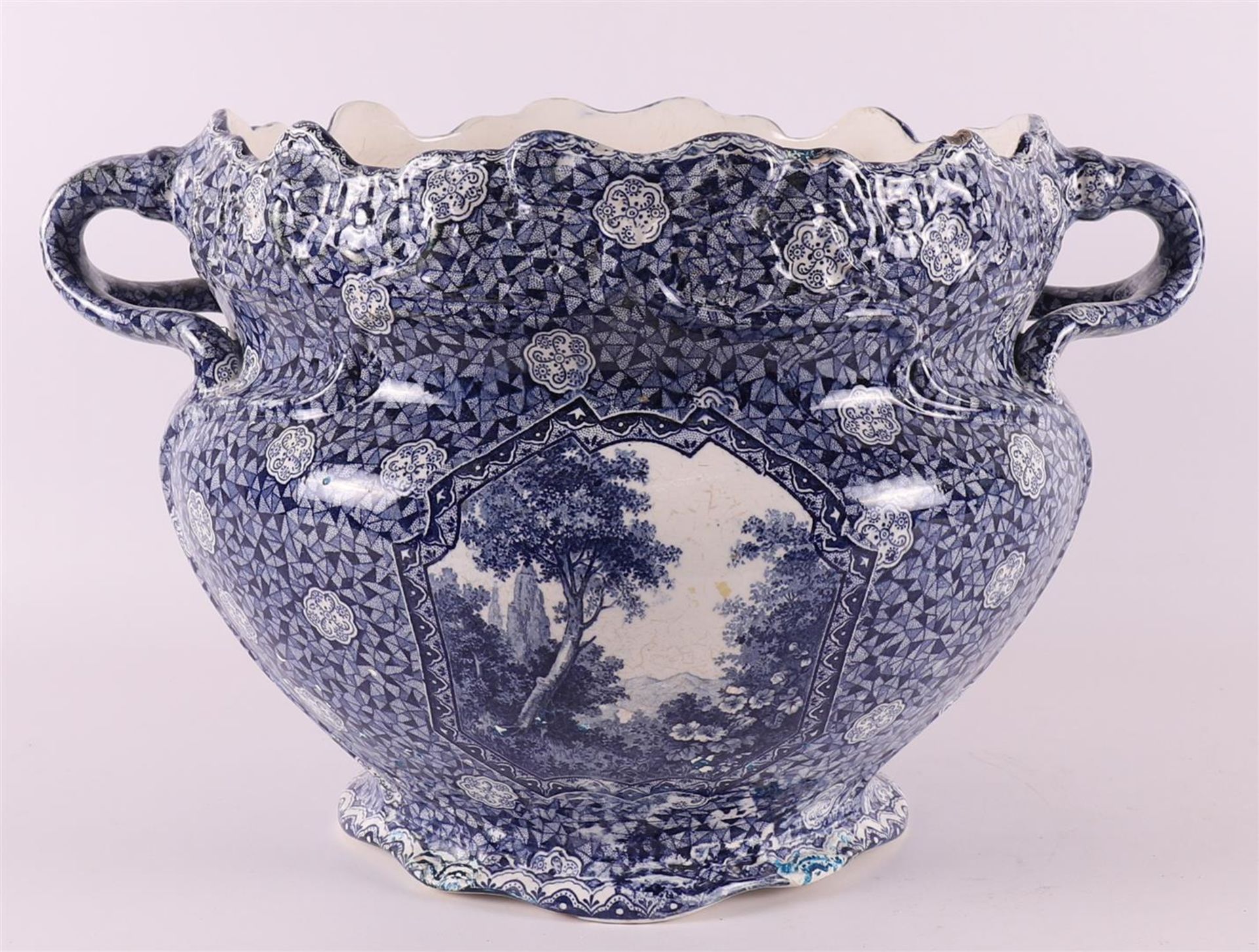 A blue earthenware cache pot, early 20th century.