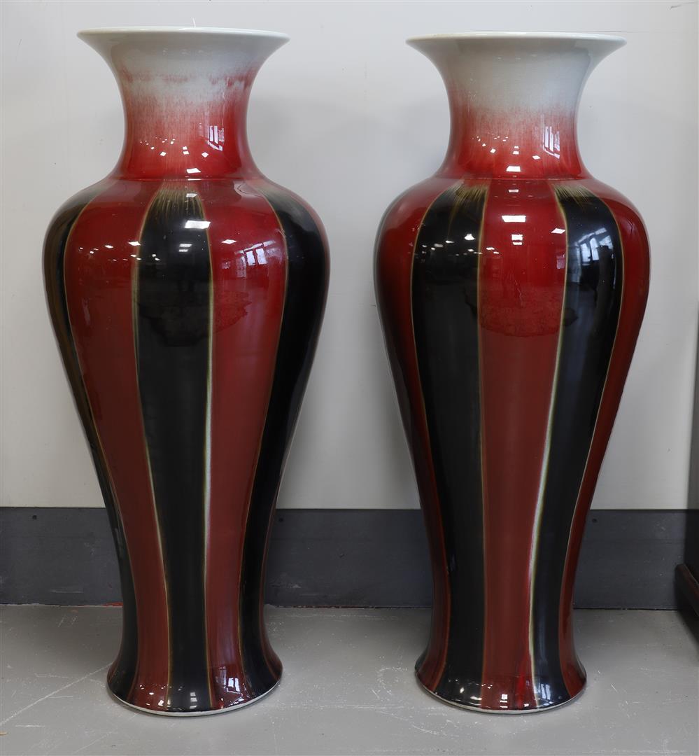 A pair of sang de boeuf / black glazed baluster vases, China, 21st century