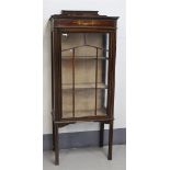 A single door display cabinet, England, circa 1900.