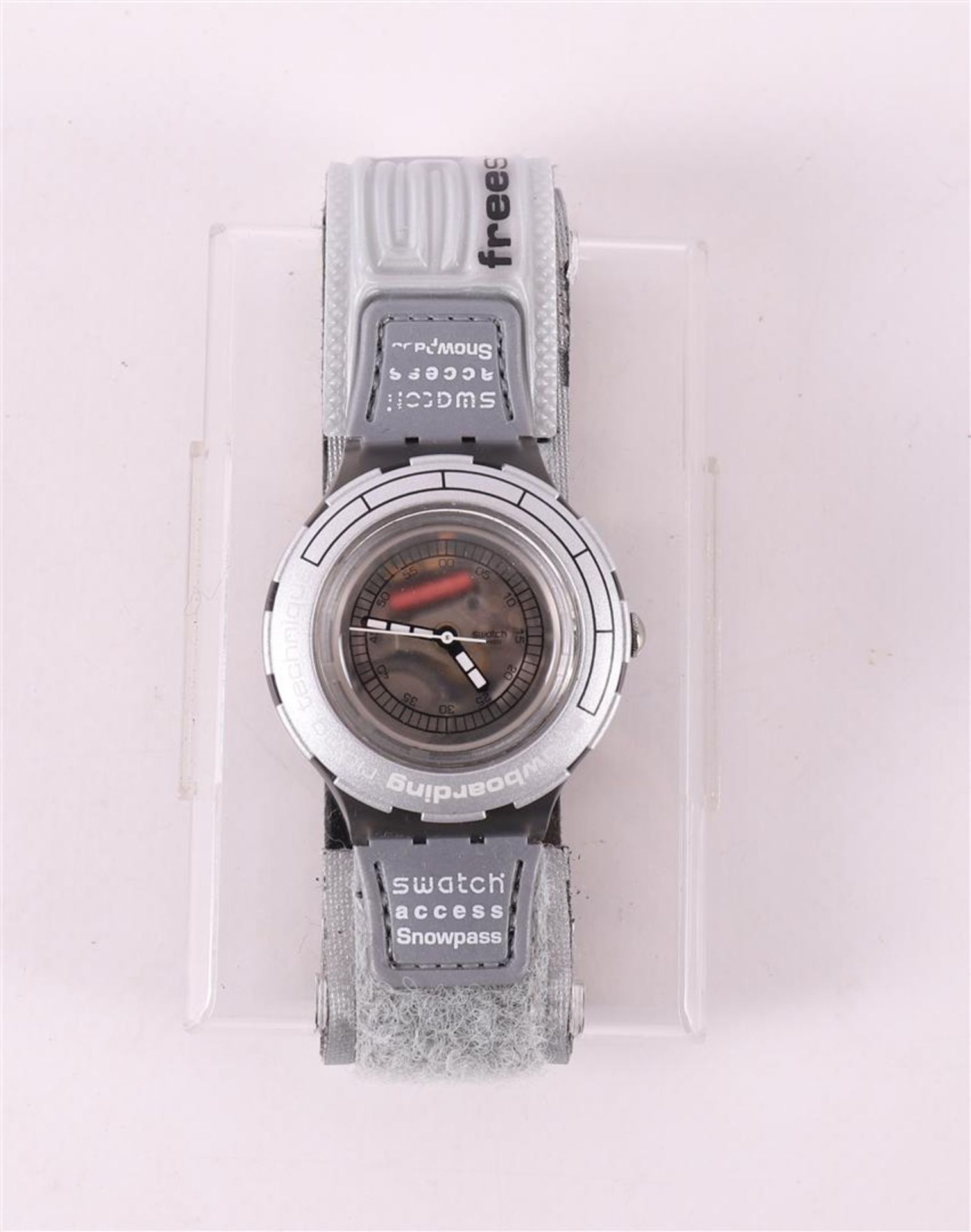 A Swatch wristwatch in cassette, KeyWatch function.