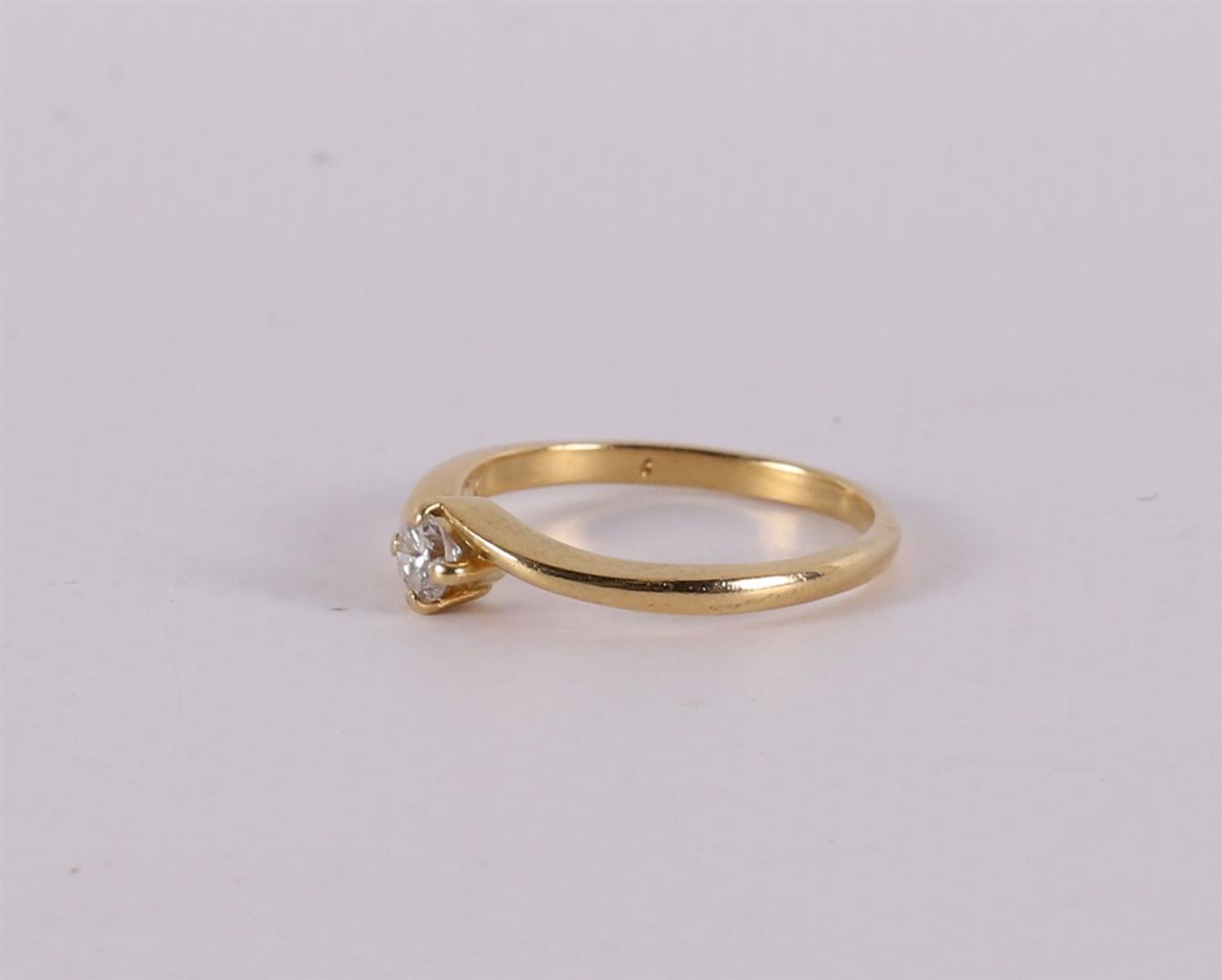 An 18 carat gold solitaire ring with a brilliant. - Image 2 of 2