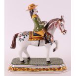 A polychrome pottery rider on horseback, Makkum, mid 20th century.