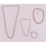 Three various, including 1st grade silver necklaces and a bracelet.