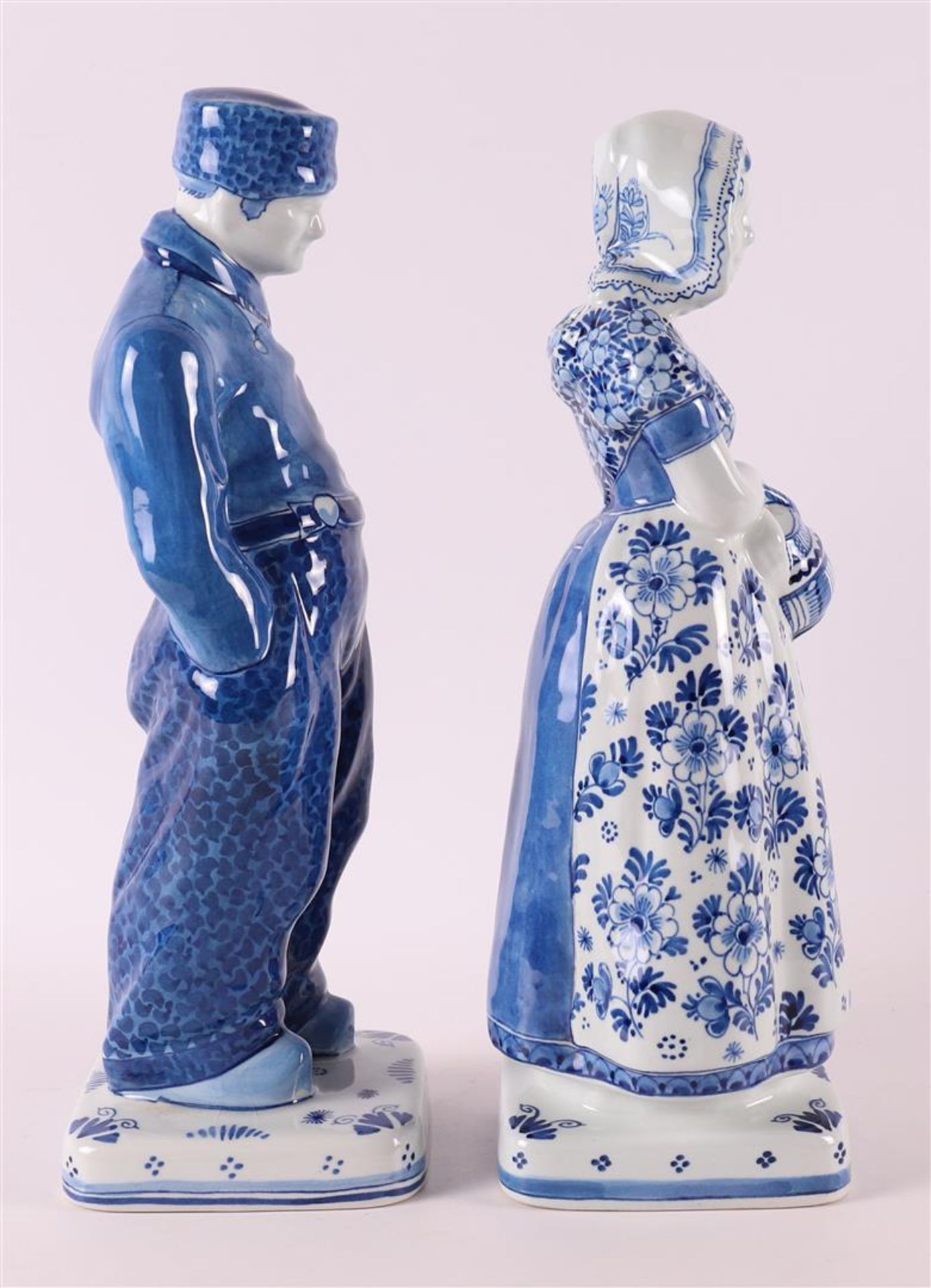 An earthenware farmer and farmer's wife in traditional costume, De Porceleyne Fl - Image 3 of 5