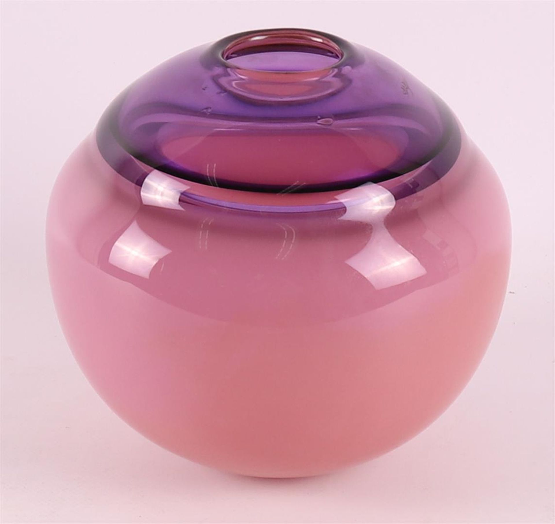 A pink and purple clear glass spherical unica vase, signed 'F. Meydam