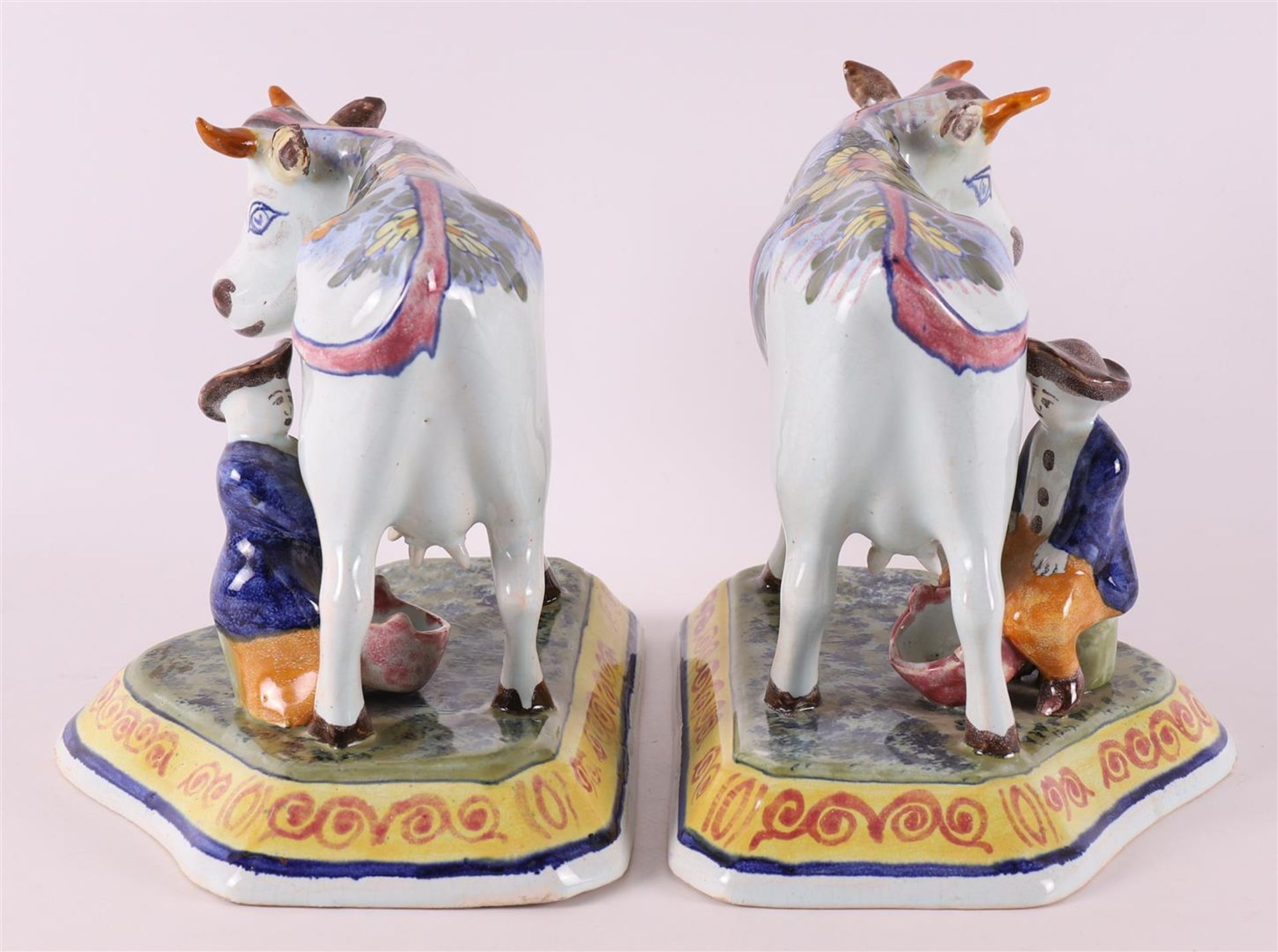 A set of polychrome earthenware cows with milkers, Porselyne bottle / Oud Delft. - Image 4 of 6