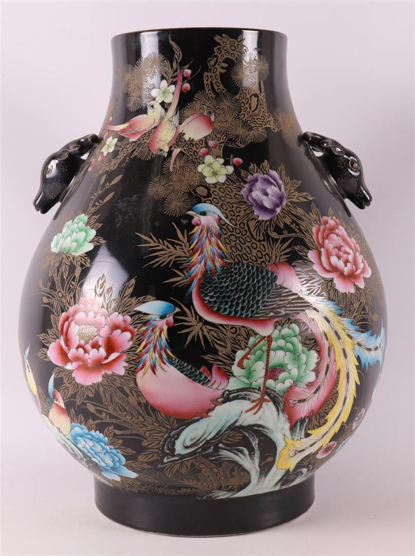 A porcelain famille noir vase with deer heads for ears, after Kangxi, China