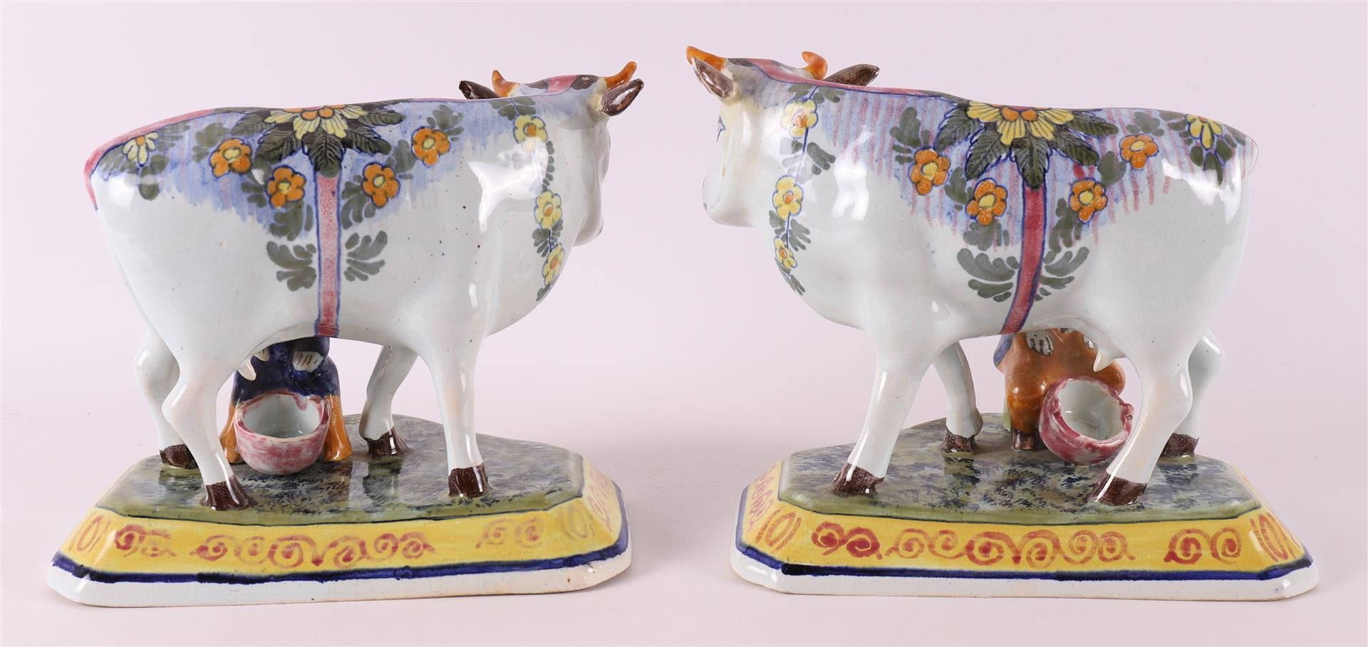 A set of polychrome earthenware cows with milkers, Porselyne bottle / Oud Delft. - Image 3 of 6