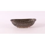 An oval djocja silver 800/1000 bonbon basket, Indonesia ca. 1930.