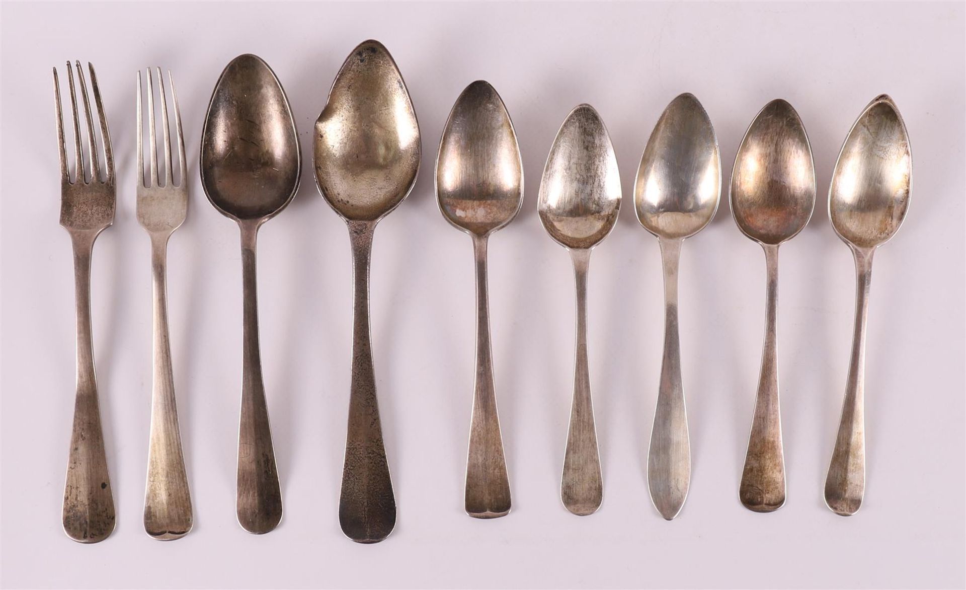 A lot of various 2nd grade 835/1000 silver spoons and forks, 428 grams in total.