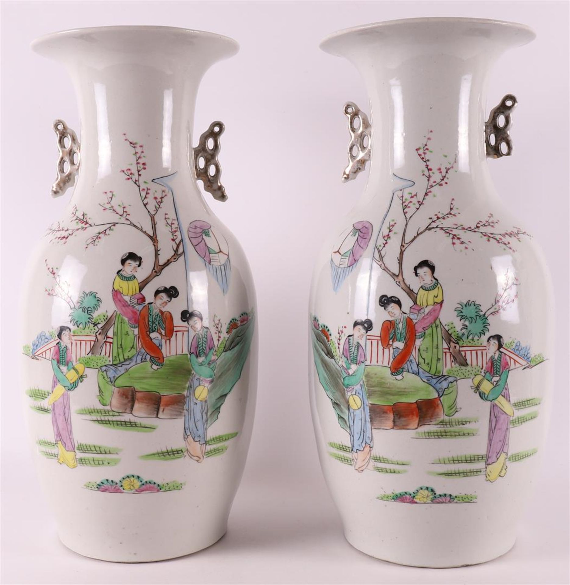 A pair of china baluster-shaped vases with handles, China, circa 1900.