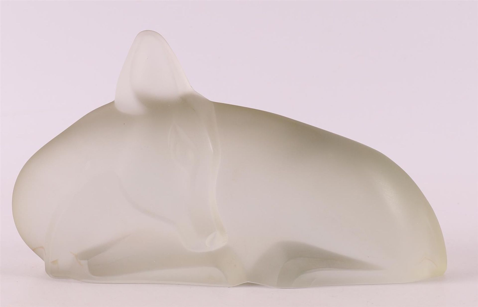 A satin glass plastic in the shape of a reclining deer, Lucienne Bloch.