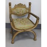 A gilded wooden Dagobert chair, 19th century.