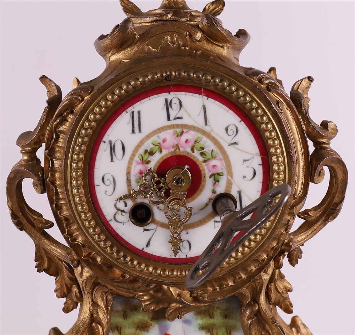 A gilded white metal mantel clock under a glass bell jar, France, 19th century. - Image 4 of 5