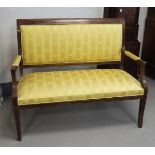 A two seater sofa with yellow fabric upholstery, glued in walnut, 19th century.