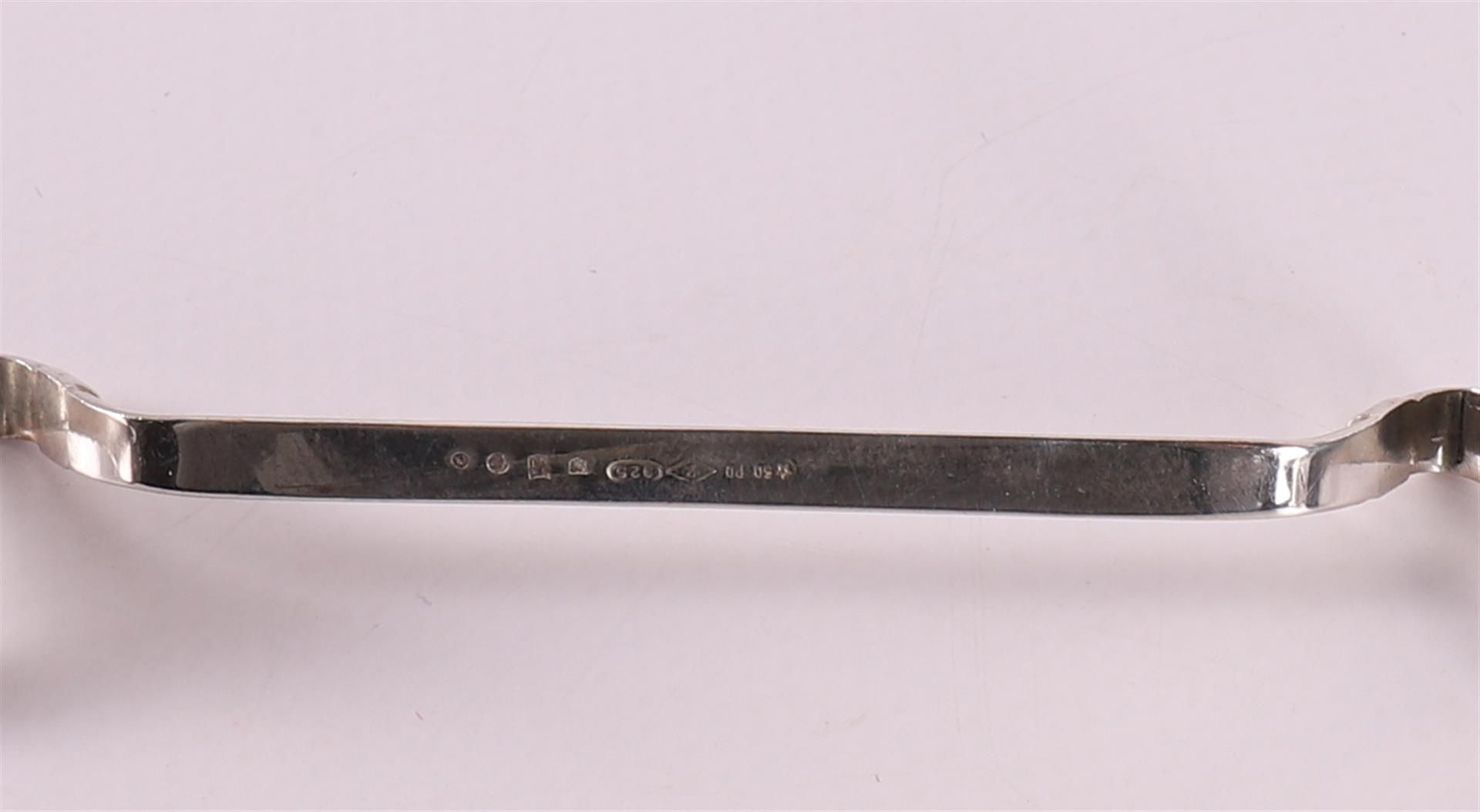 A set of nine first grade 925/1000 silver knife rests. - Bild 2 aus 2