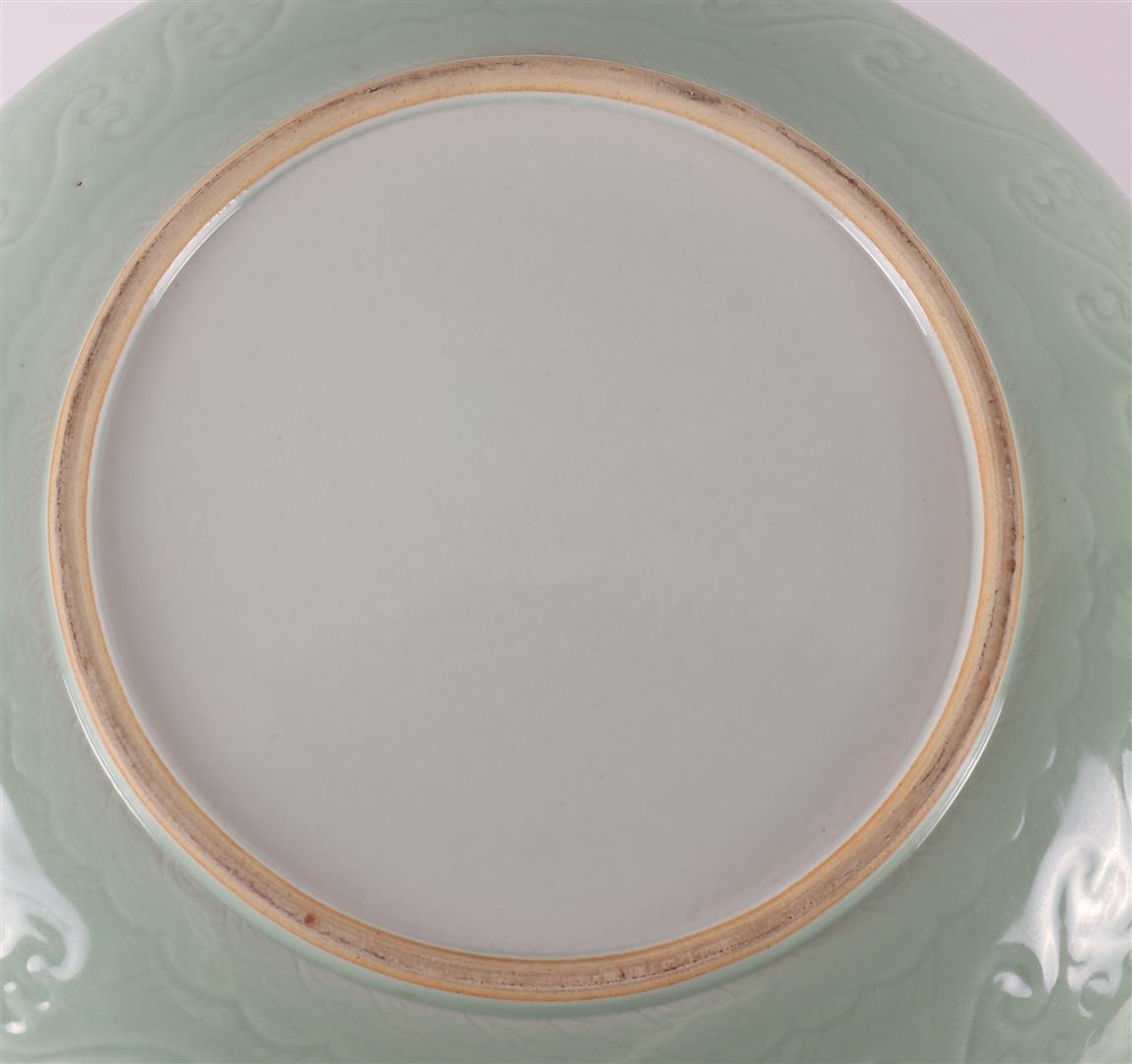 A capital celadon porcelain dish, China, after Ming, of later date. - Image 4 of 5