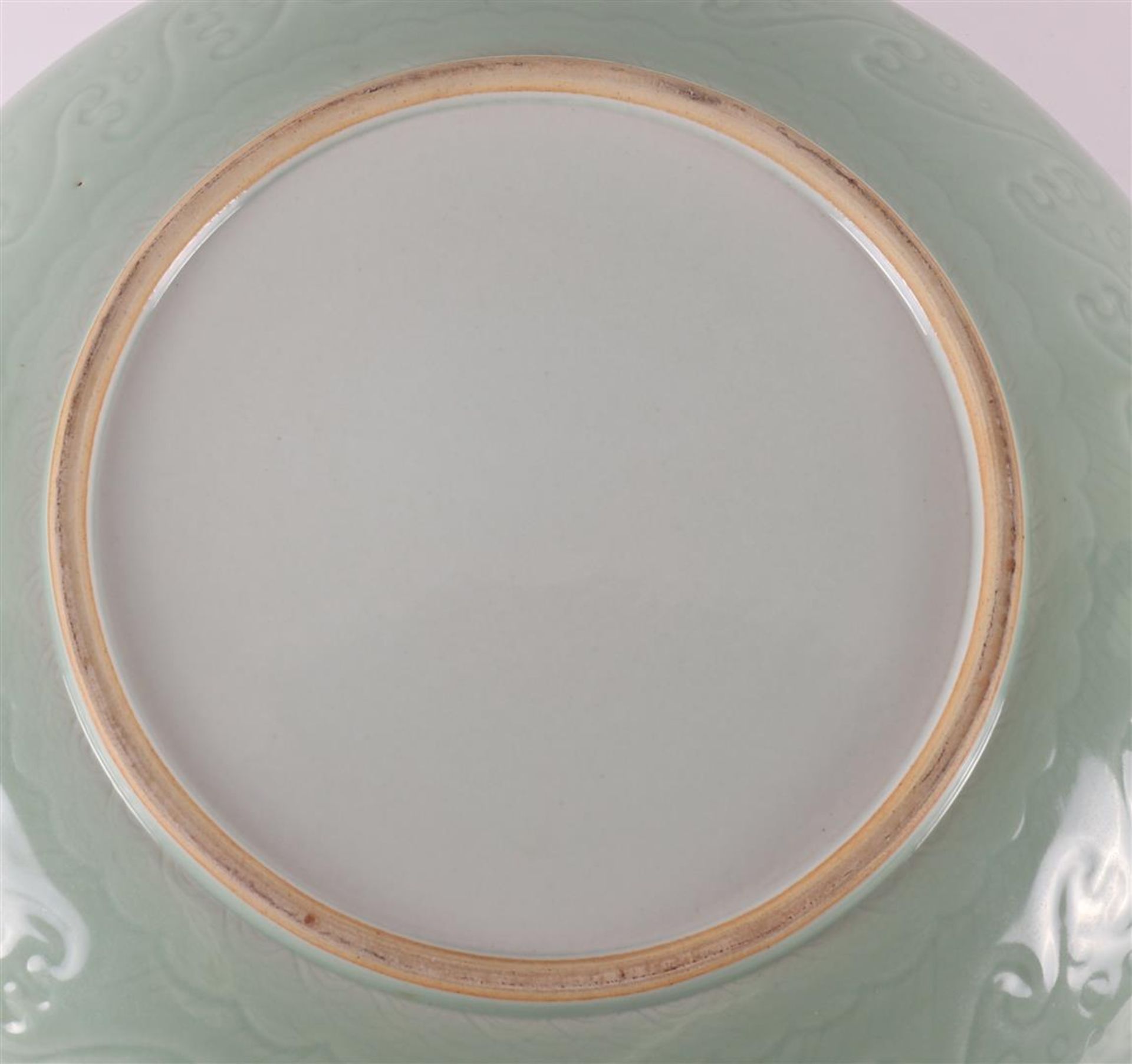 A capital celadon porcelain dish, China, after Ming, of later date. - Image 4 of 5