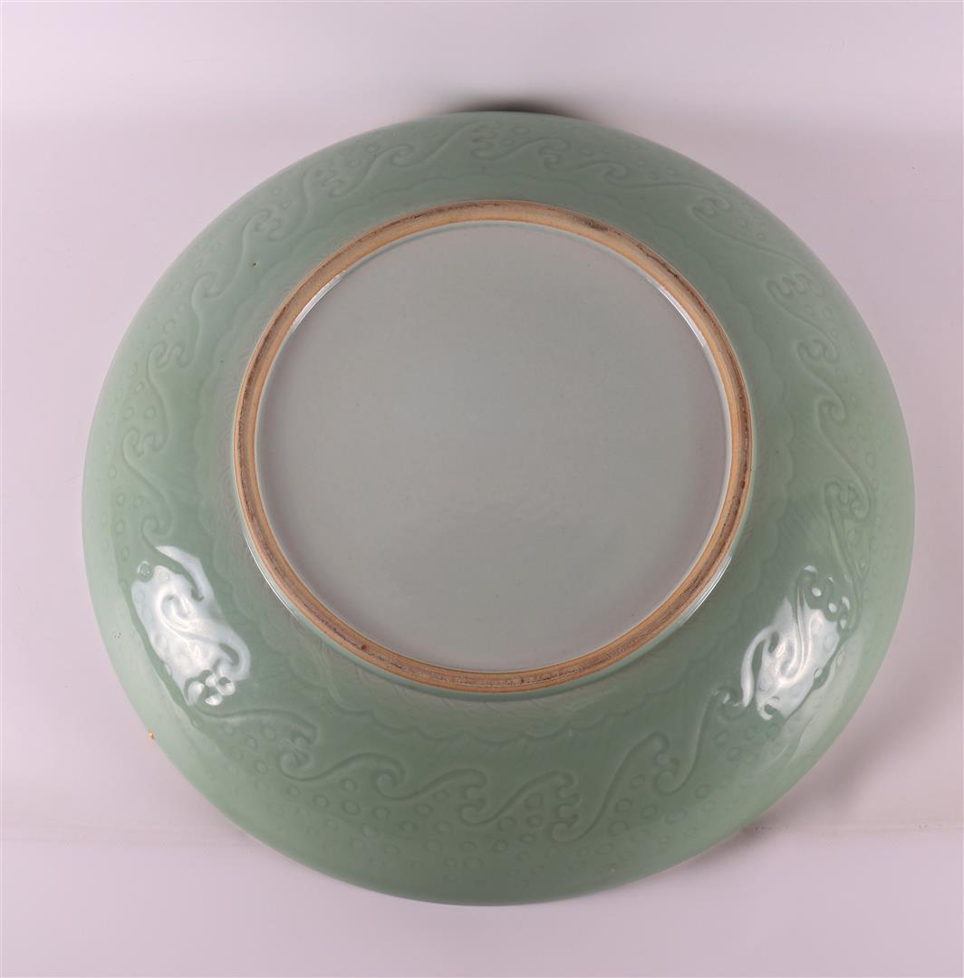 A capital celadon porcelain dish, China, after Ming, of later date. - Image 5 of 5