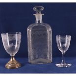 A clear glass square decanter and two glasses, including 19th century.