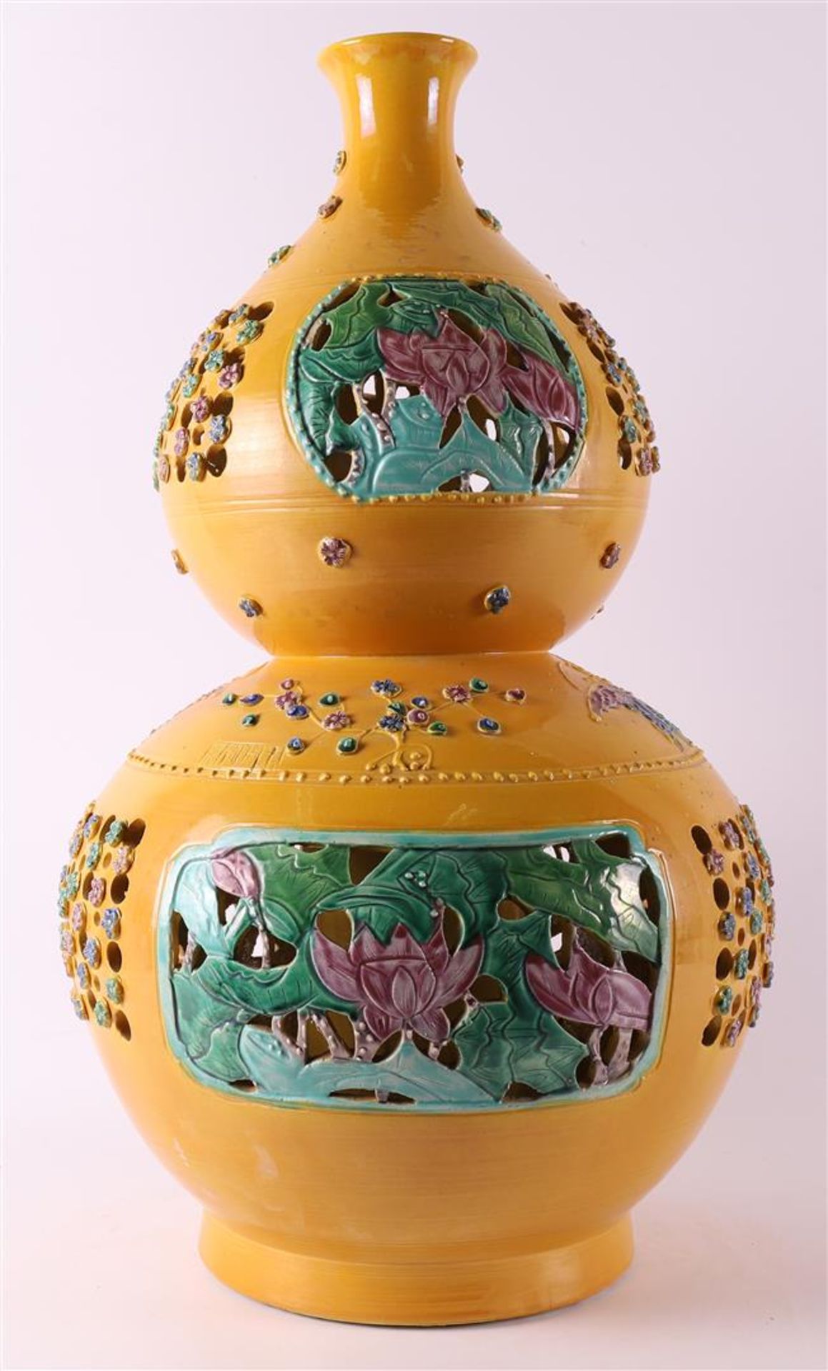 An Imperial yellow glazed gourd shaped porcelain vase, China, 21st century.