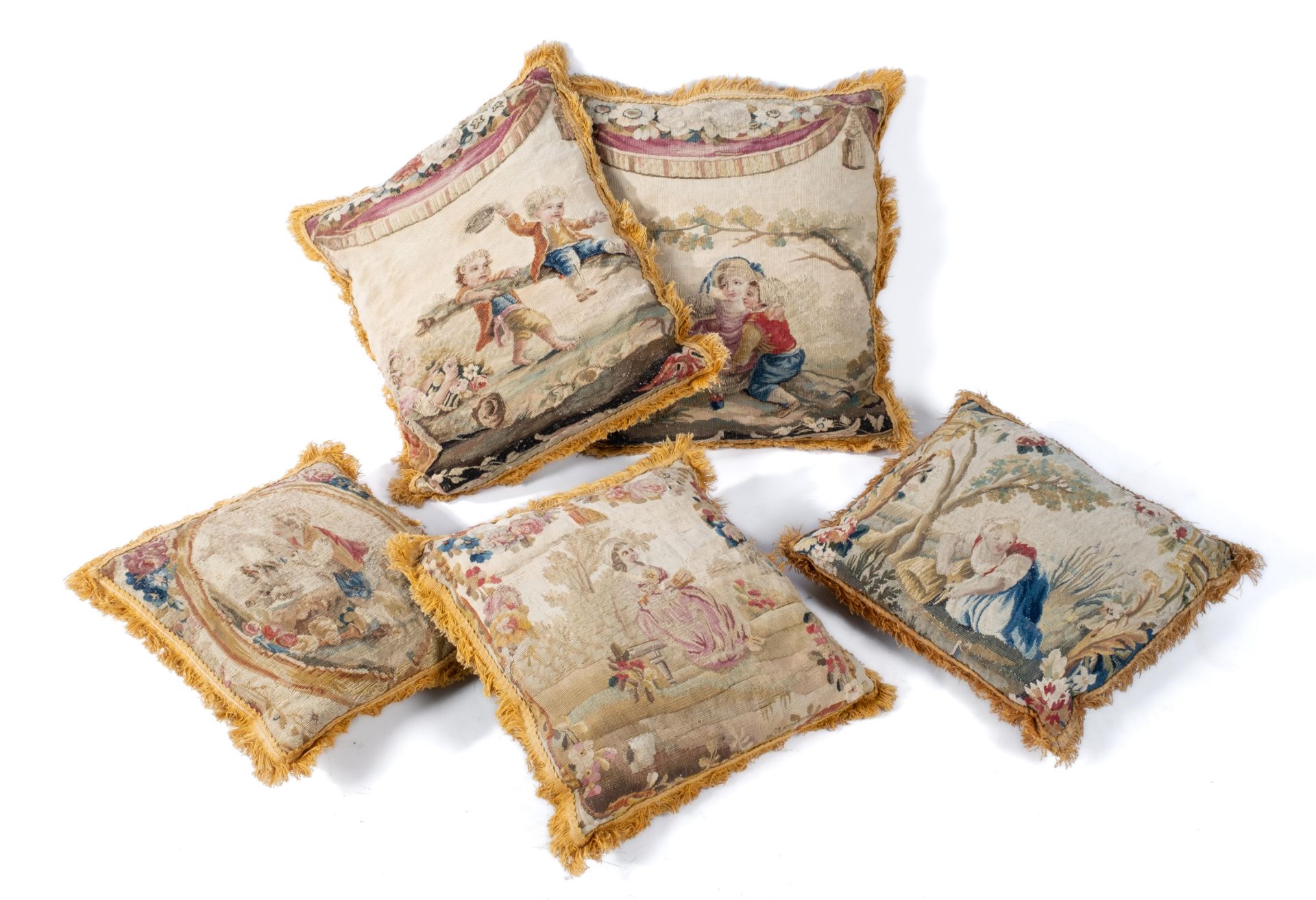 A set of five Louis XVI tapisserie cushions, probably after cartons by Jean-Baptiste Huet (1745-1811