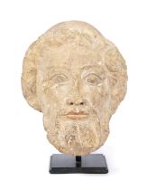 A North-European carved stone head of an apostle