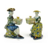 A rare pair of Delft polychrome pottery figures