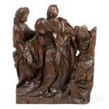 A Flemish carved and polychrome painted oak group of the Swooning of the Virgin