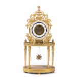 An Empire ormolu skeleton clock
