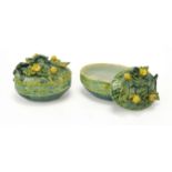 A pair of Delft polychrome lidded dishes in the form of melons