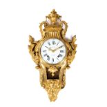 A Louis XVI ormolu cartel clock