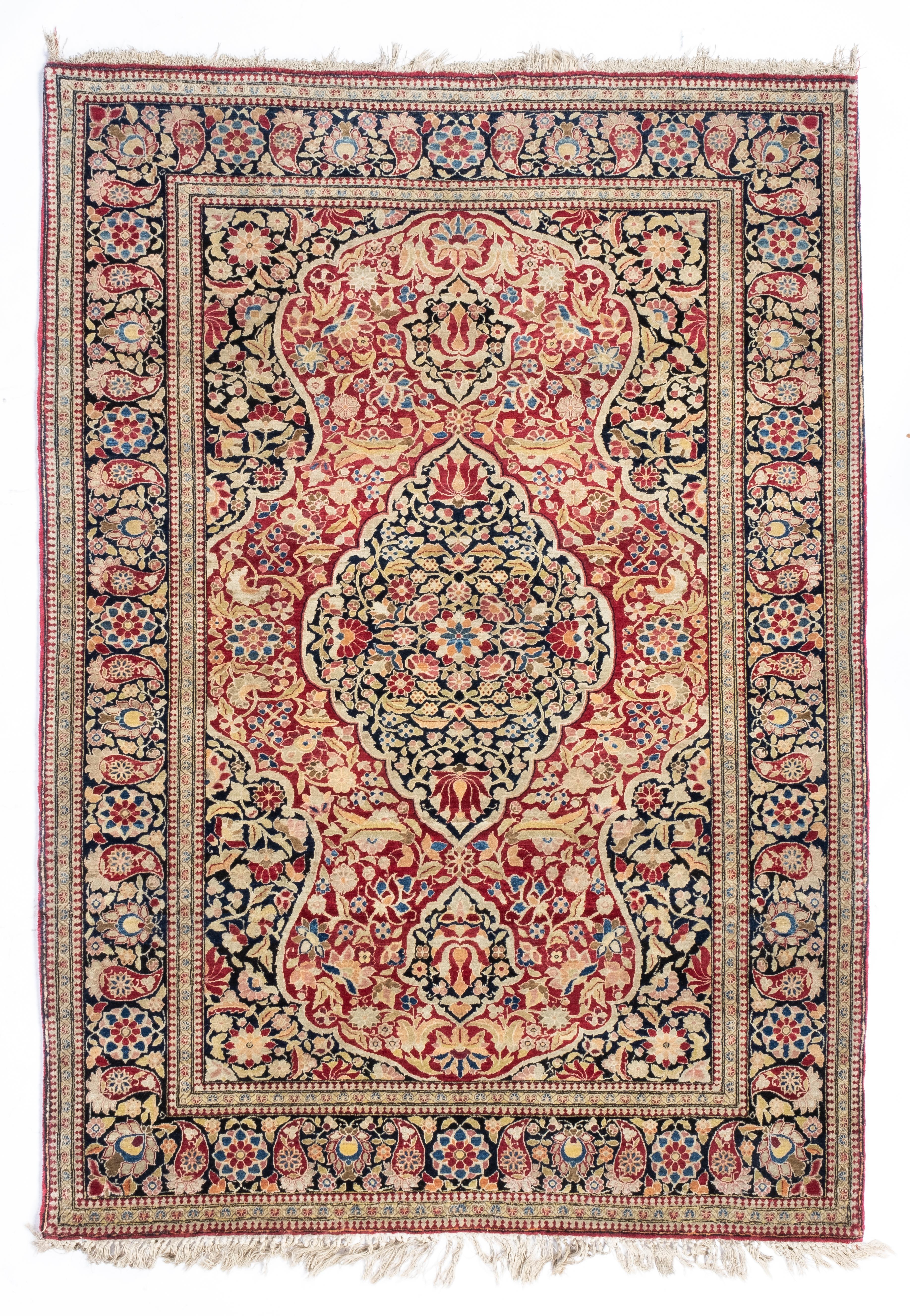 An antique Isfahan wool rug